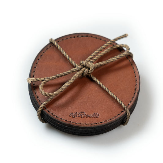 Pack of four handmade Finnish leather coasters. Free engraving included. 